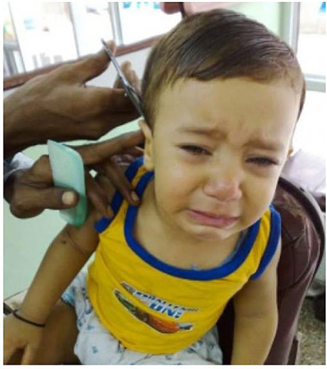 儿童理发时的各种哭闹窘相。